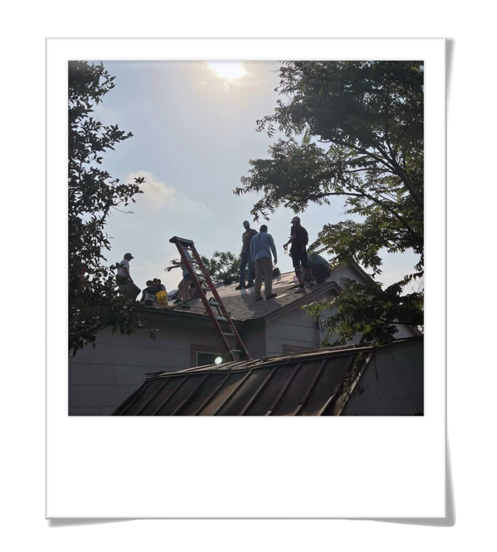 Youth helping on roof